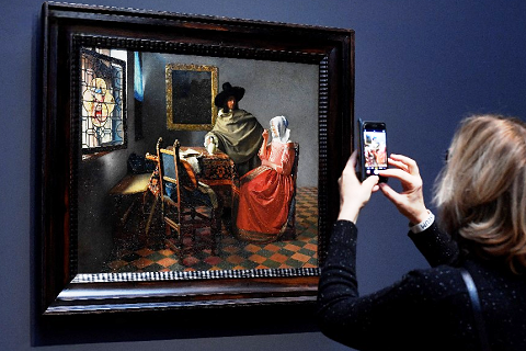 フェルメール作「紳士とワインを飲む女」